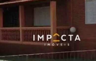 Imagem: A casa possui 3 Dormitórios, 1 Banheiro, 5 Vagas na garagem