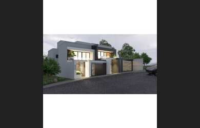 Imagem: A casa possui 3 Dormitórios, 4 Banheiros, 2 Vagas na garagem