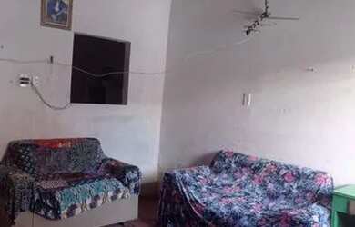 Imagem: A casa possui 2 Dormitórios, 2 Banheiros e está localizado