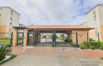 Imagem: O apartamento possui 3 Dormitórios, 1 Banheiro, 2 Vagas na