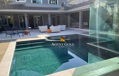 Imagem: A casa em condomínio possui 5 Dormitórios, 5 Banheiros, 5