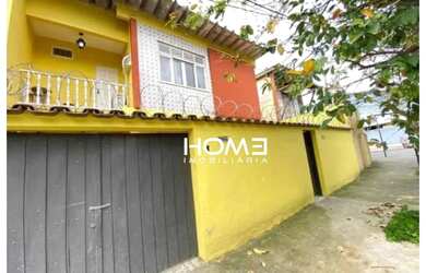 Imagem: A casa possui 5 Dormitórios, 4 Banheiros, 2 Vagas na garagem