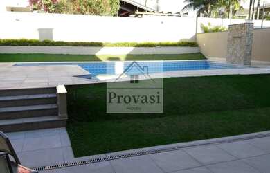 Imagem: A casa em condomínio possui 4 Dormitórios, 5 Banheiros, 4