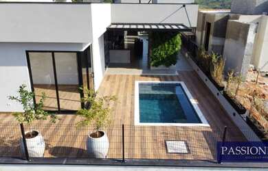 Imagem: A casa em condomínio possui 3 Dormitórios, 5 Banheiros, 4