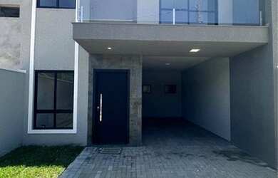 Imagem: A casa possui 3 Dormitórios, 3 Banheiros, 2 Vagas na garagem