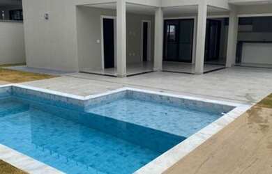 Imagem: A casa em condomínio possui 3 Dormitórios, 5 Banheiros, 5