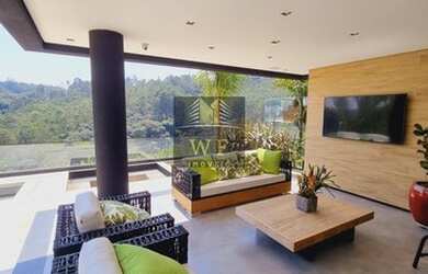 Imagem: A casa em condomínio possui 4 Dormitórios, 5 Banheiros, 5