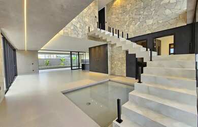 Imagem: A casa em condomínio possui 5 Dormitórios, 5 Banheiros, 4