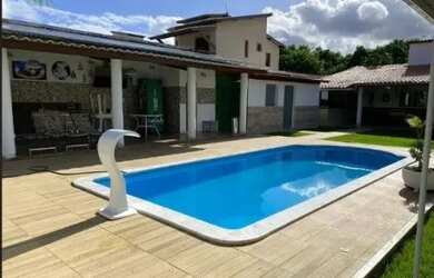 Imagem: A casa possui 3 Dormitórios, 3 Banheiros, 3 Vagas na garagem