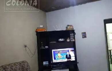 Imagem: A casa possui 3 Dormitórios, 1 Banheiro, 1 Vaga na garagem