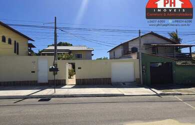 Imagem: A casa possui 2 Dormitórios, 3 Banheiros, 4 Vagas na garagem