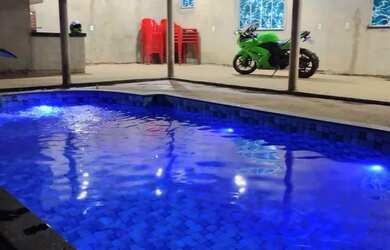 Imagem: A casa possui 1 Dormitório e 5 Vagas na garagem e está localizado