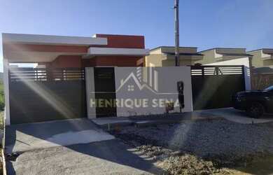 Imagem: A casa possui 3 Dormitórios, 2 Banheiros, 3 Vagas na garagem