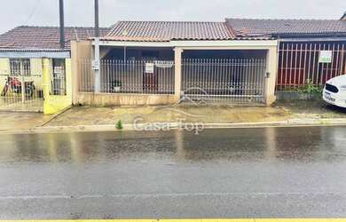 Imagem: A casa possui 2 Dormitórios, 2 Banheiros, 1 Vaga na garagem