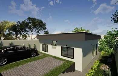 Imagem: A casa possui 3 Dormitórios, 2 Banheiros, 1 Vaga na garagem