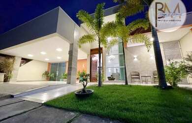 Imagem: A casa possui 3 Dormitórios, 4 Banheiros, 3 Vagas na garagem