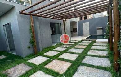 Imagem: A casa possui 2 Dormitórios, 3 Banheiros, 1 Vaga na garagem