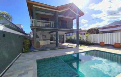 Imagem: A casa em condomínio possui 5 Dormitórios, 5 Banheiros, 4