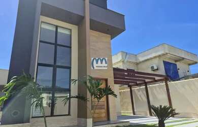 Imagem: A casa possui 3 Dormitórios, 2 Banheiros, 2 Vagas na garagem