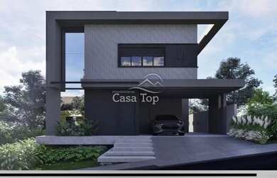 Imagem: A casa possui 3 Dormitórios, 4 Banheiros, 2 Vagas na garagem