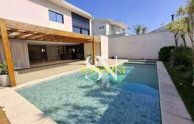 Imagem: A casa em condomínio possui 4 Dormitórios, 5 Banheiros, 4