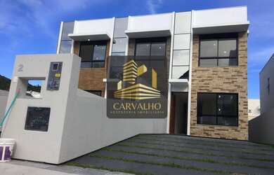 Imagem: A casa possui 2 Dormitórios, 2 Banheiros, 2 Vagas na garagem