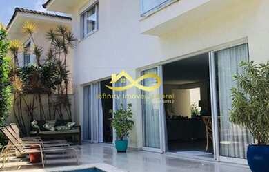 Imagem: A casa em condomínio possui 5 Dormitórios, 5 Banheiros, 2