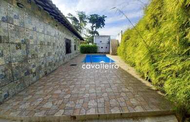 Imagem: A casa possui 5 Dormitórios, 4 Banheiros, 1 Vaga na garagem