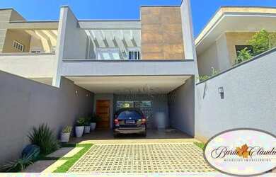 Imagem: A casa possui 4 Dormitórios, 5 Banheiros, 4 Vagas na garagem