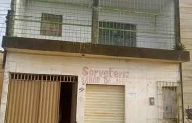 Imagem: A casa possui 3 Dormitórios, 1 Banheiro, 2 Vagas na garagem