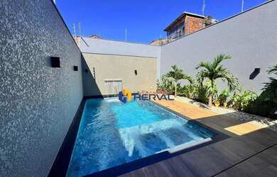 Imagem: A casa possui 3 Dormitórios, 3 Banheiros, 3 Vagas na garagem