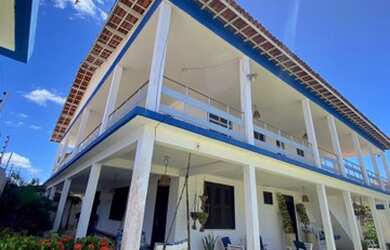 Imagem: A casa possui 5 Dormitórios, 5 Vagas na garagem e está localizado