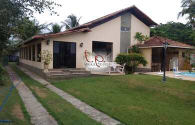 Imagem: A casa possui 5 Dormitórios, 5 Banheiros, 5 Vagas na garagem