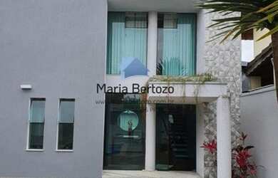 Imagem: A casa possui 3 Dormitórios, 5 Banheiros, 5 Vagas na garagem