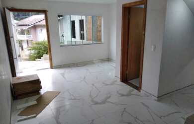 Imagem: A casa possui 3 Dormitórios, 2 Banheiros, 1 Vaga na garagem