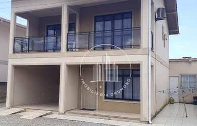 Imagem: A casa possui 2 Dormitórios, 2 Banheiros, 3 Vagas na garagem