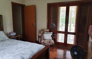 Imagem: A casa em condomínio possui 4 Dormitórios, 5 Banheiros, 5