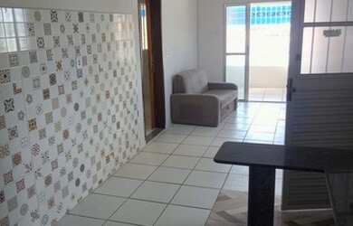 Imagem: A casa possui 2 Dormitórios e 1 Banheiro e está localizado