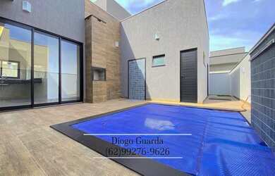 Imagem: A casa possui 3 Dormitórios, 5 Banheiros, 4 Vagas na garagem