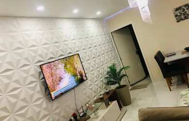 Imagem: A casa possui 2 Banheiros, 3 Vagas na garagem e 21m² de Área