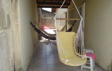 Imagem: A casa possui 2 Dormitórios, 5 Vagas na garagem, 80m² de Área