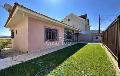 Imagem: A casa possui 4 Dormitórios, 2 Banheiros, 1 Vaga na garagem