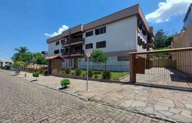 Imagem: O apartamento possui 3 Dormitórios, 1 Banheiro, 2 Vagas na