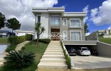 Imagem: A casa em condomínio possui 4 Dormitórios, 5 Banheiros, 5