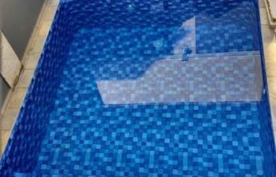 Imagem: A casa possui 3 Dormitórios, 3 Banheiros, 4 Vagas na garagem