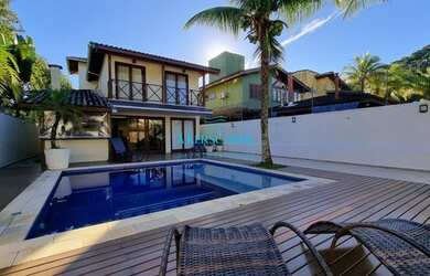 Imagem: A casa possui 5 Dormitórios, 4 Banheiros, 3 Vagas na garagem