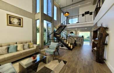 Imagem: A casa possui 3 Dormitórios, 4 Banheiros, 4 Vagas na garagem