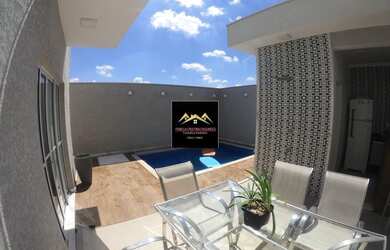 Imagem: A casa possui 3 Dormitórios, 3 Banheiros, 3 Vagas na garagem