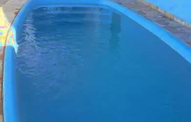 Imagem: A casa possui 2 Dormitórios, 2 Vagas na garagem e está localizado