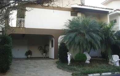 Imagem: A casa em condomínio possui 4 Dormitórios, 5 Banheiros, 4